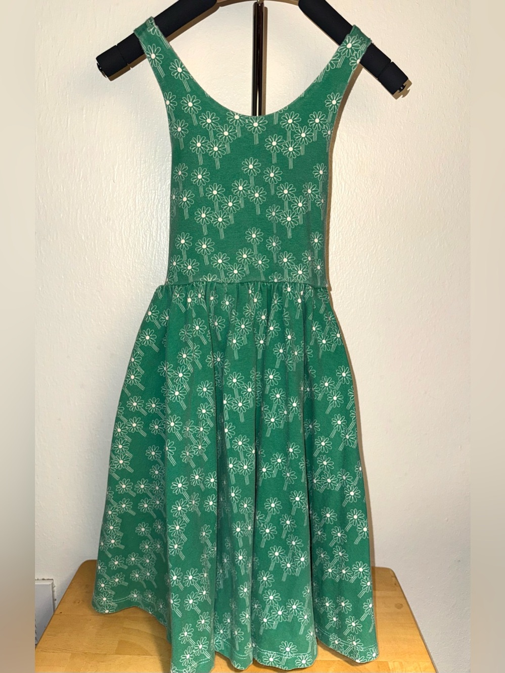 Alice + Ames pinafore dress featuring a white daisy pattern, size 7